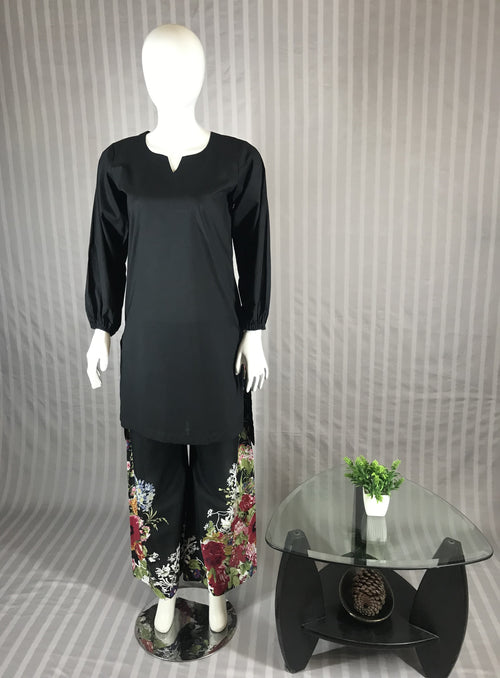 Black shirt with printed pink, blue, and white roses