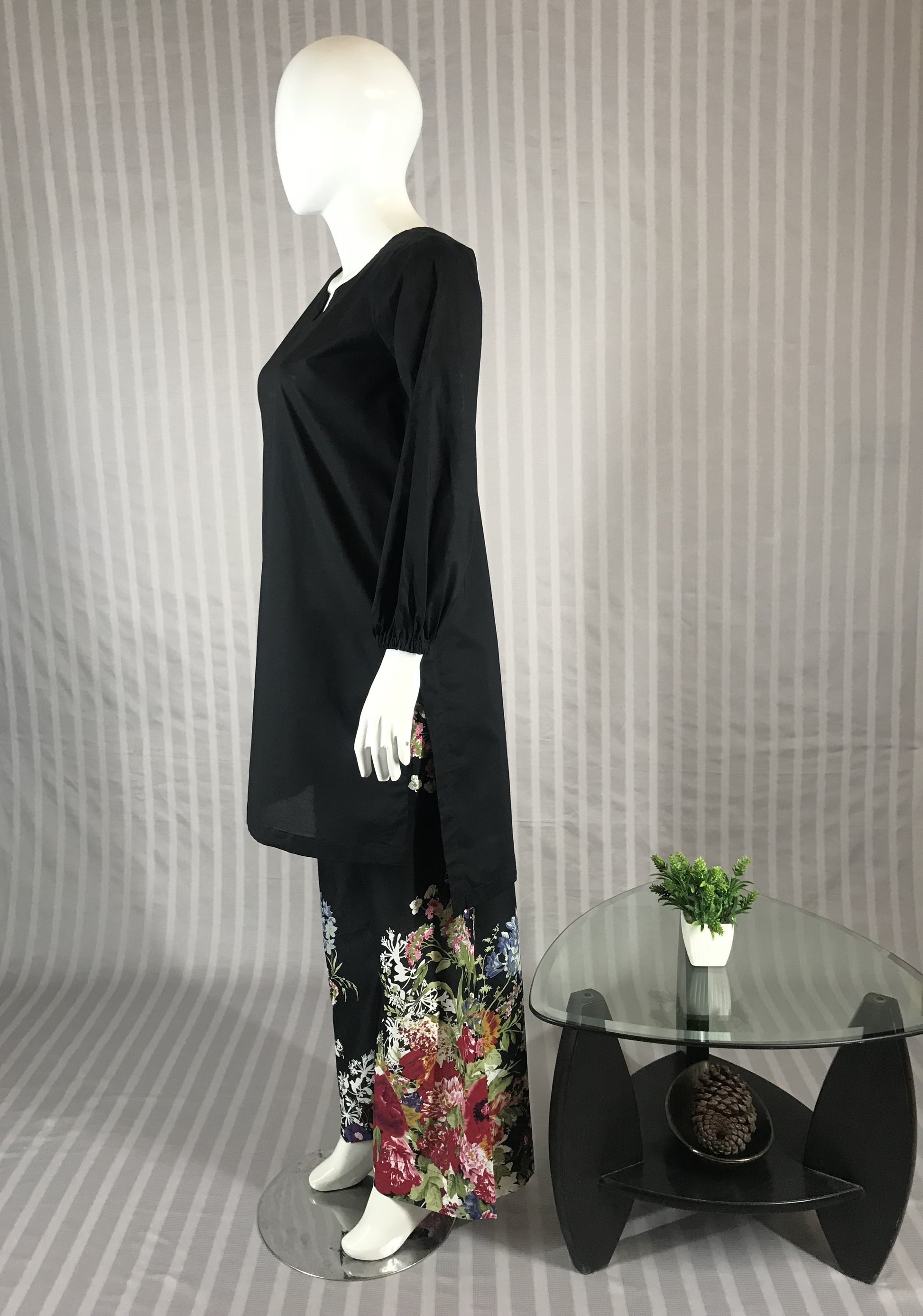 Pink and blue floral print on black fabric