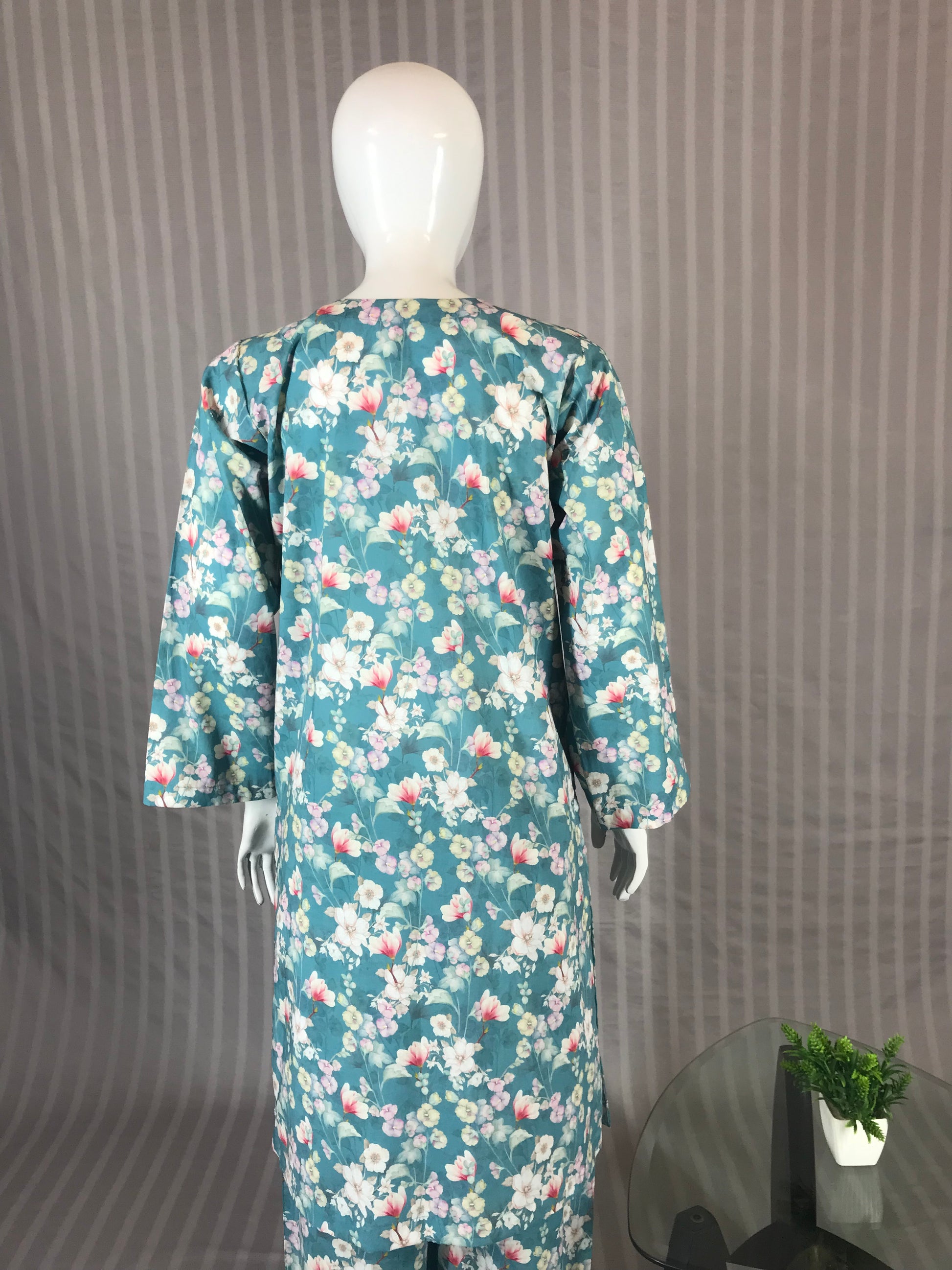 Casual floral outfit in soft sea green tones
