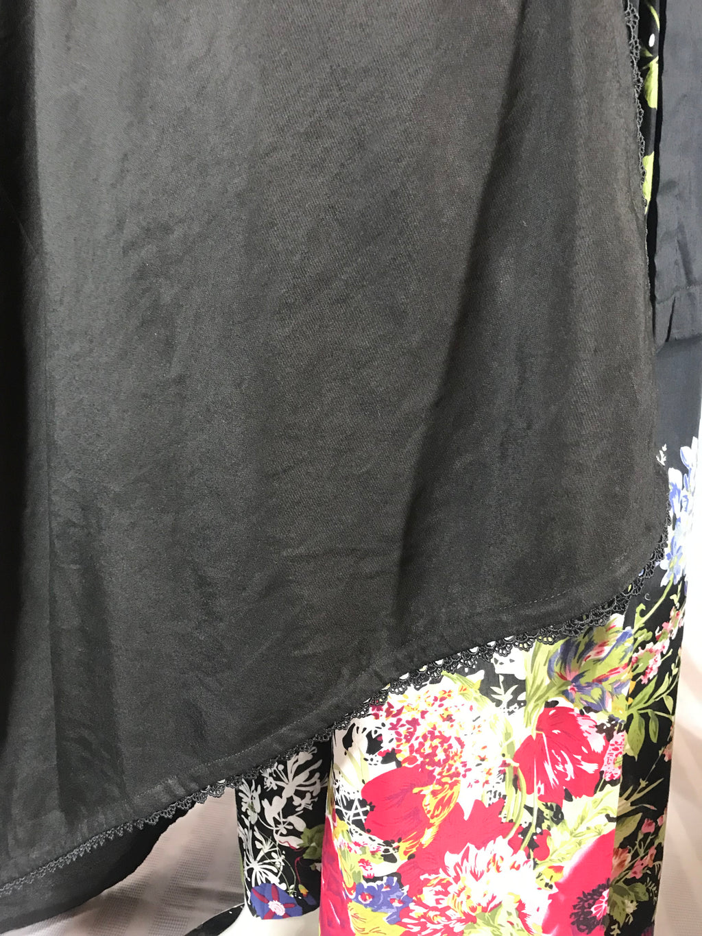 Elegant sheer black wrap draped with pleats